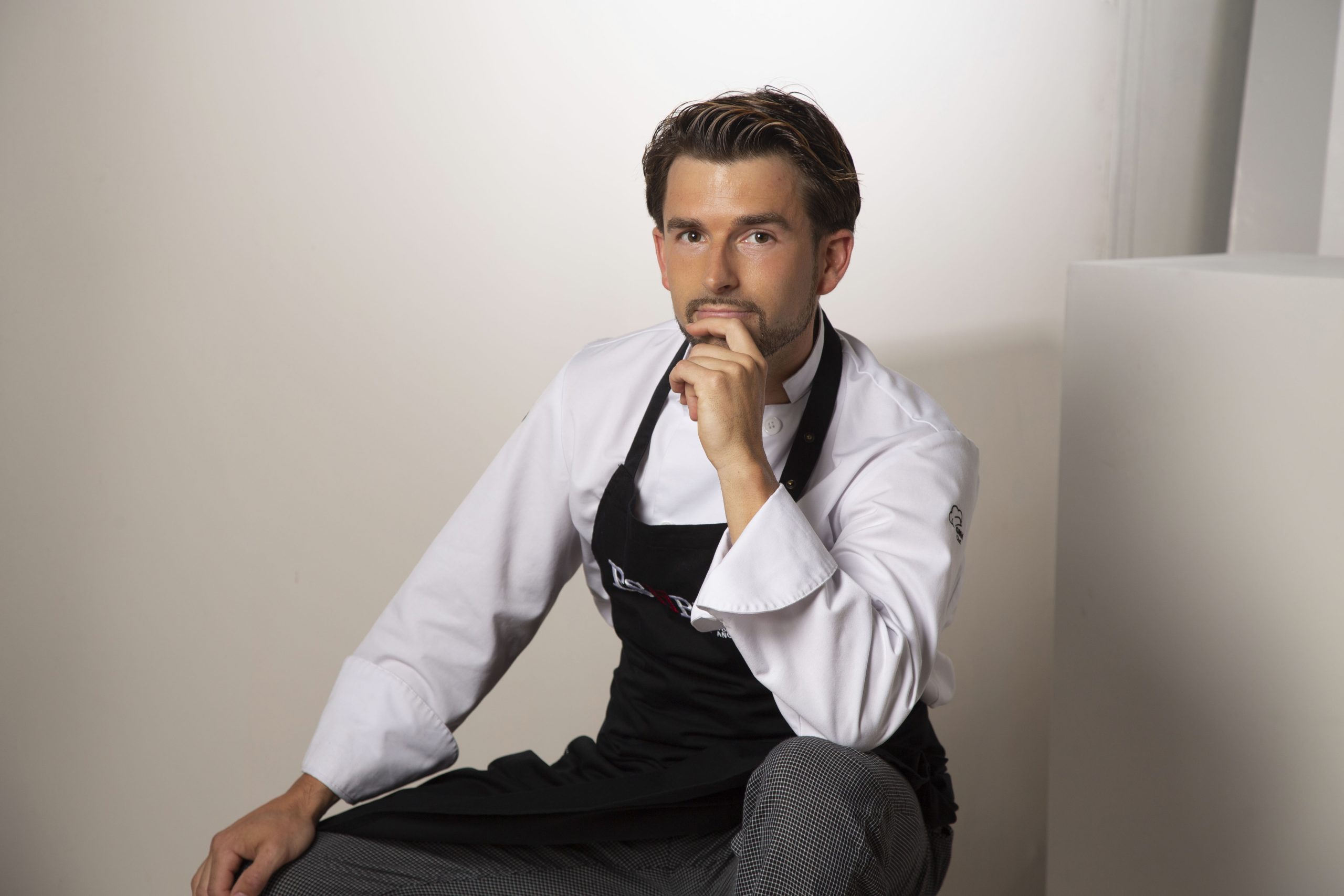 Víctor Garrido, private chef in Ibiza, preparing a Basque Mediterranean fine dining experience